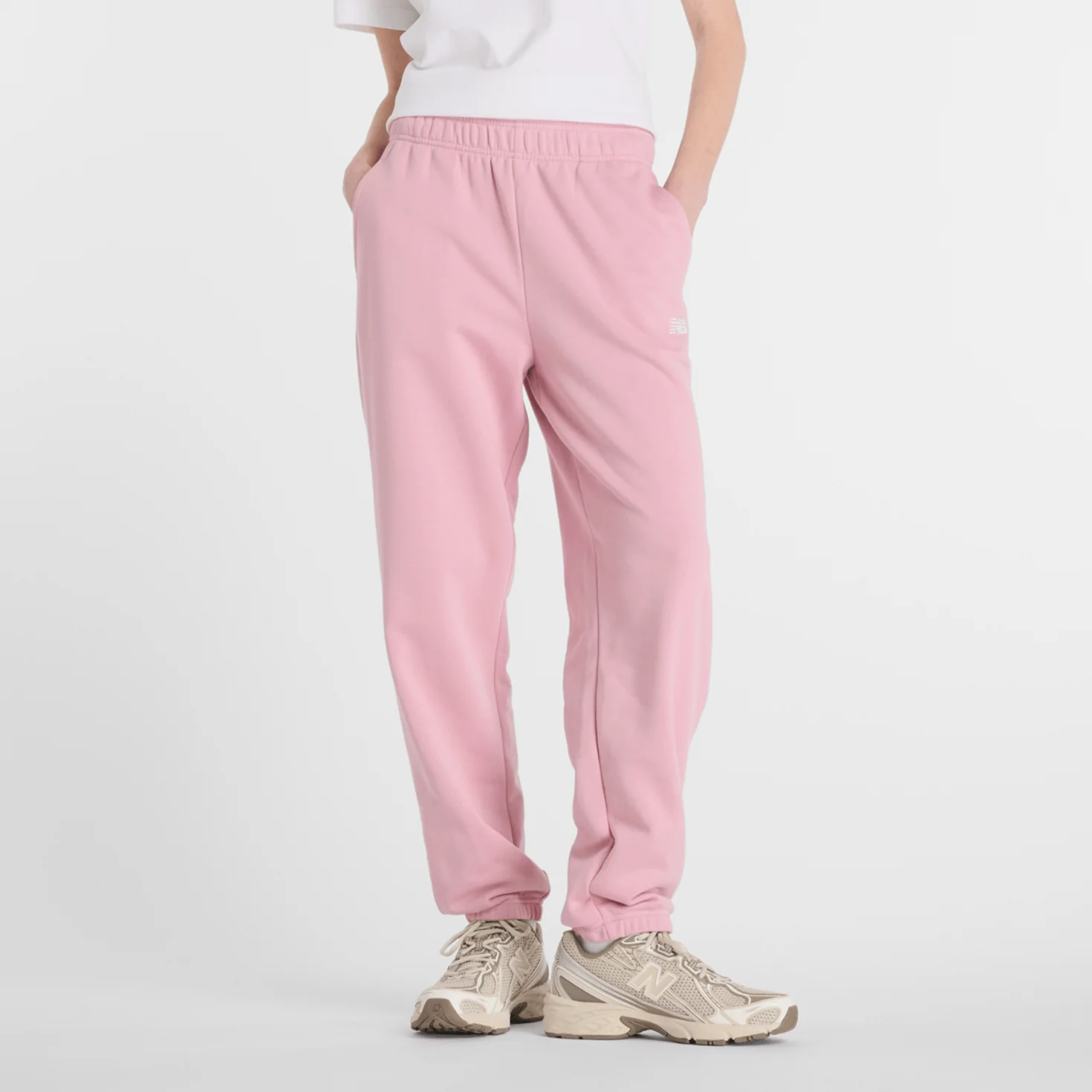 PANTALON DE SURVĂTEMENT NEW BALANCE SPORT ESSENTIALS FEMME - ROSE